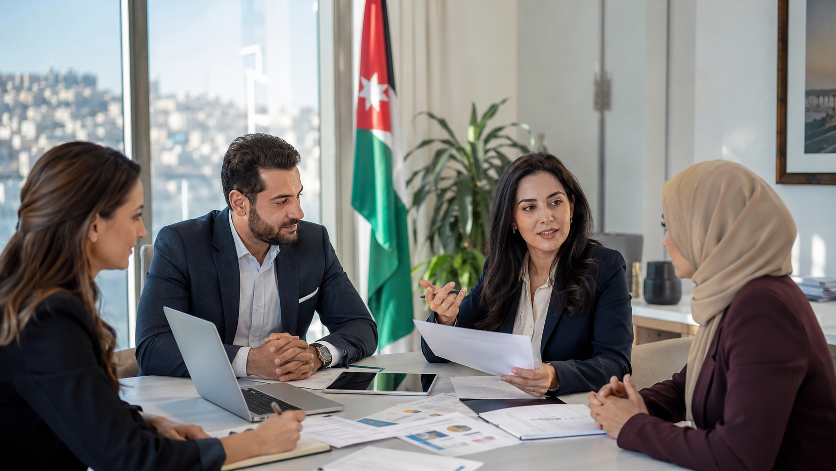 Professional team discussing Employer of Record services in Jordan